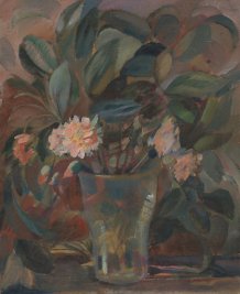 Fleurs et feuilles dans un vase en verrre