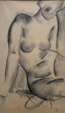 Femme nu assise de trois quart