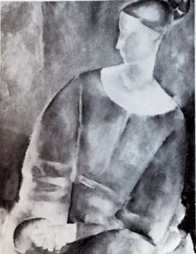 Jeune femme au chignon assise